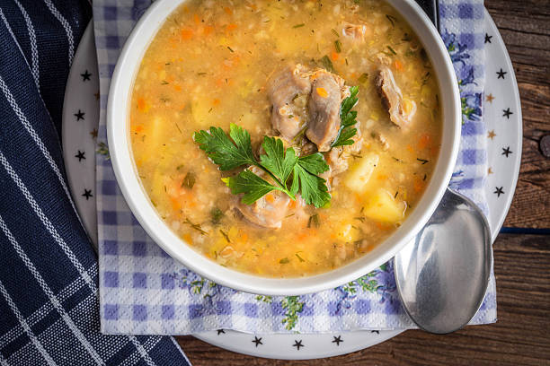 istock Soup with barley and chicken gizzards. 635922542