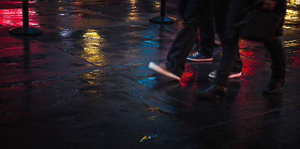 istock NYC streets after rain with reflections on wet asphalt 635923012