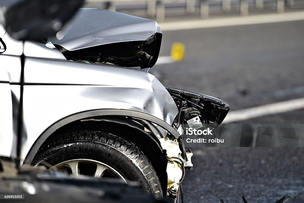 Car crash detail with damaged automobile Detail with damage automobile after a car crash accident Car Accident Stock Photo