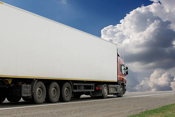 istock The truck on asphalt road 635923406
