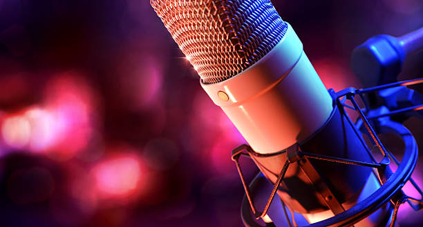 istock Close up studio condenser microphone and equipment live recordin 635926062