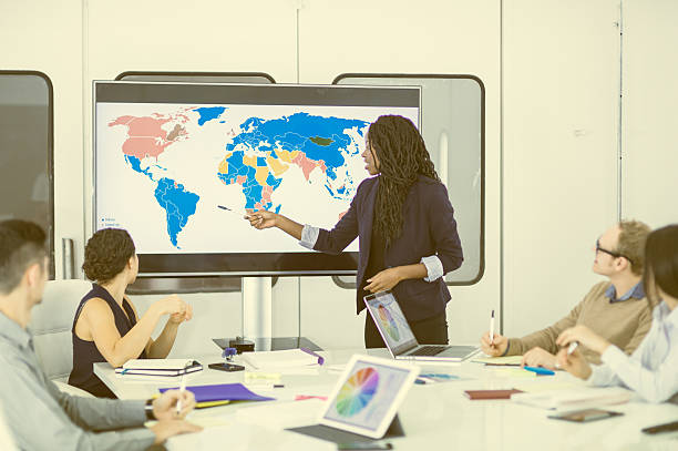 istock Ethnic female business leader giving presentation 635932666
