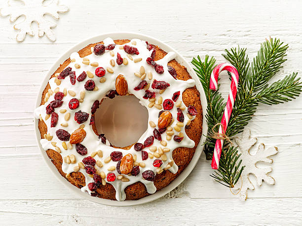 istock christmas cake on white wooden table 635934090