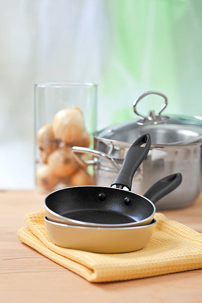 istock cooking equipment on wooden table 635934190