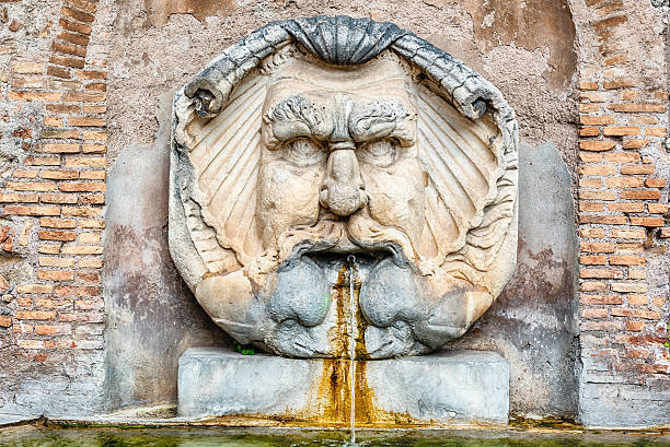 istock Fountain with mask, Rome, Italy 635934996