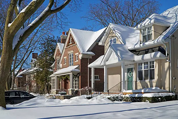 Photo of houses with snow