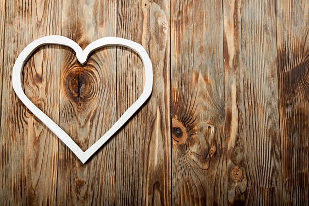 istock Holidays gift and heart on wooden rustic background. Valentines day 635941086