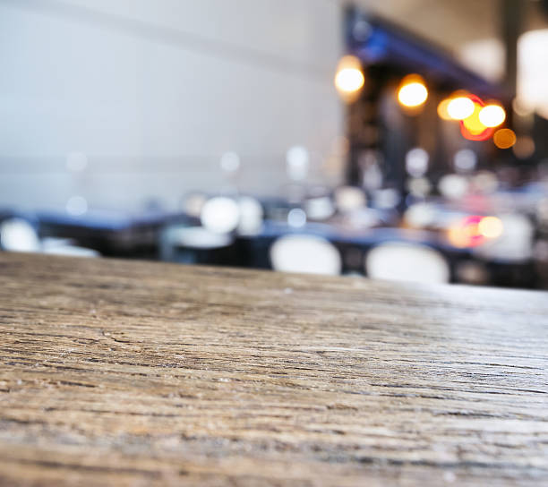istock Table top counter Blurred seats Bar Restaurant background 635941728