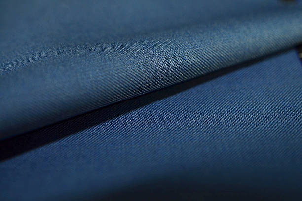 istock close up roll striped dark blue fabric of suit 635944438