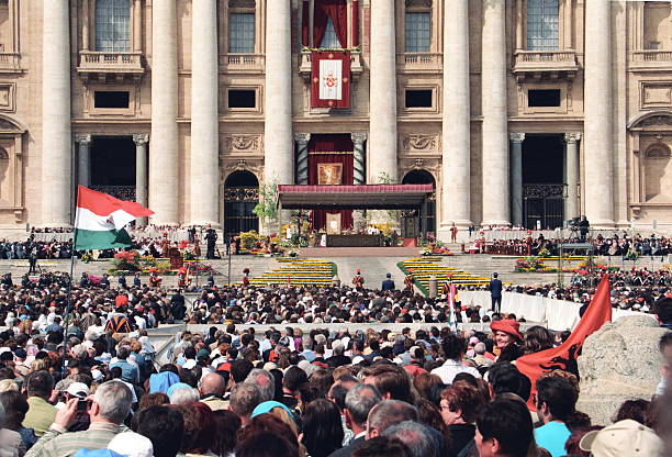 Vatican city, Vatican - April 16, 2006: People gather at the St Peter's square to attend the Easter celebration led by Pope Benedict XVI, in Vatican, Italy.
