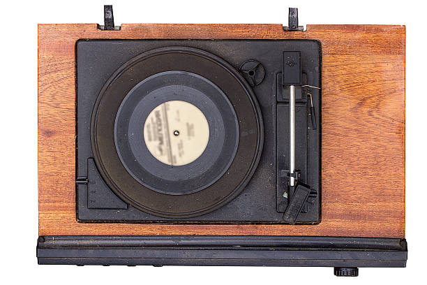 istock Old vinyl turntable player  isolated on a white background 635946580