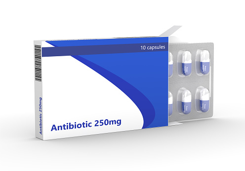 3d rendering of antibiotic pills in blister pack isolated over white background