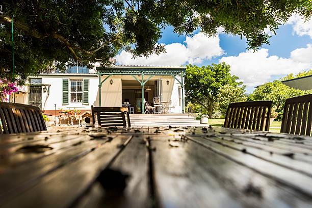 istock Surface level of table with house in background 635949348
