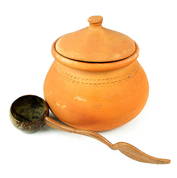 istock Water Clay pots and coconut shell ladle 635950738