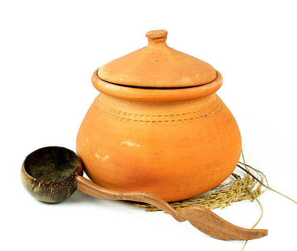 istock Water Clay pots and coconut shell ladle 635950810