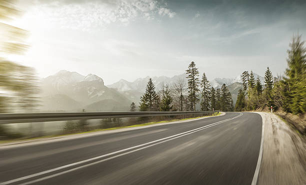 mountain road at high speed - autumn landscape usa country road imagens e fotografias de stock