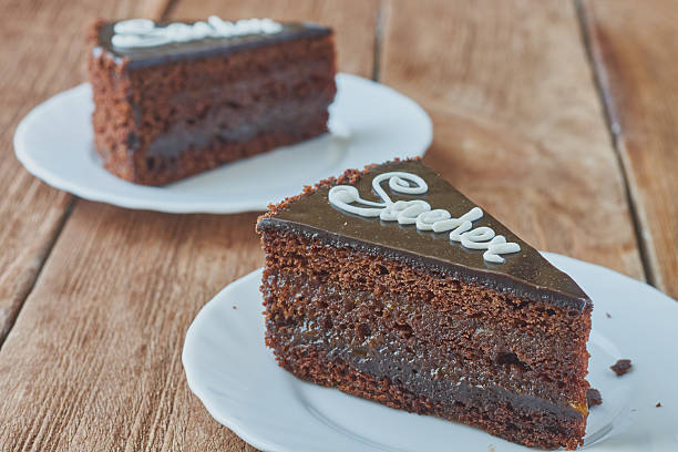 istock Delicious cake Sacher on a wooden background 635951674