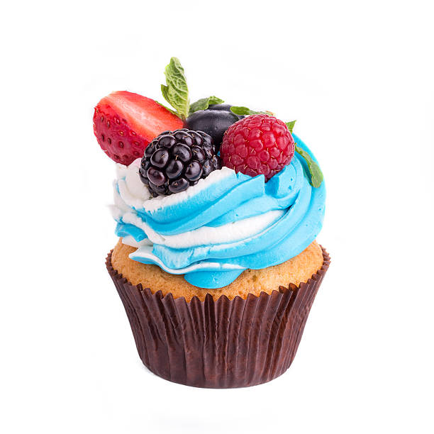 istock Cupcakes with berries on a white background. Isolated. 635953922