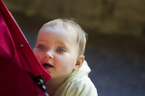 istock Baby girl playing 635956422