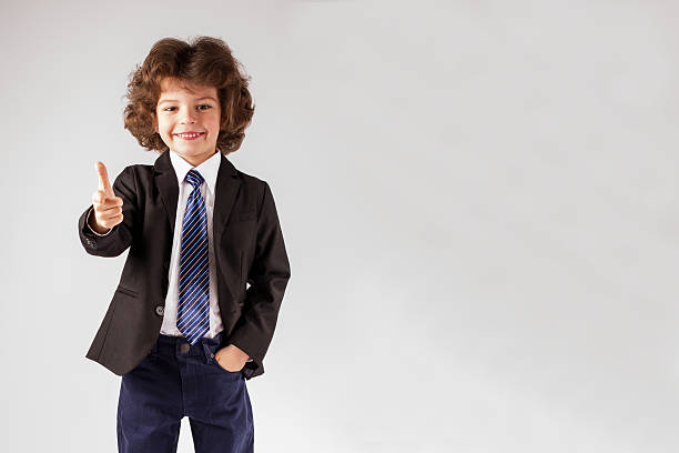 istock Cute little boy stretched out his hand in greeting. White 635958888
