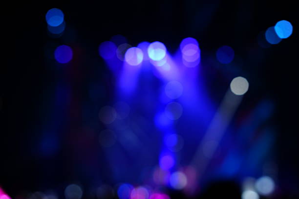 istock Defocused entertainment concert lighting on stage 635960542