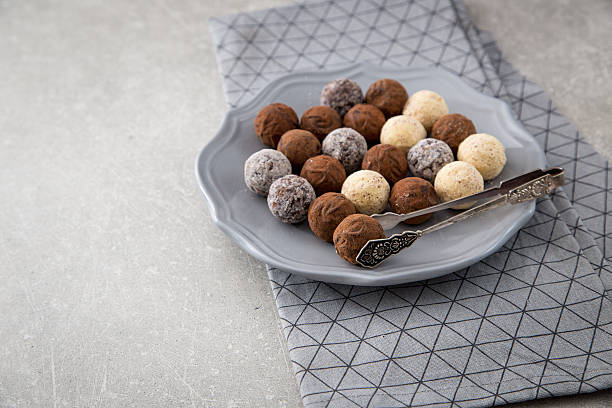 istock Assorted chocolate truffles with cocoa powder 635961044