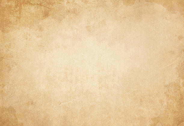 istock Old yellowed and stained paper texture. 635963916