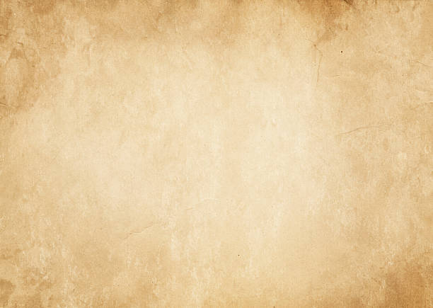 istock Old yellowed and spotted paper texture. 635964340
