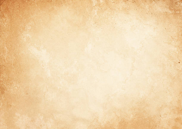 istock Old yellowed and spotted paper texture. 635964448