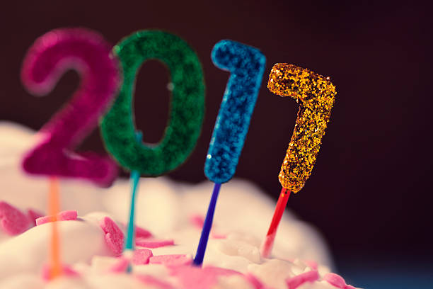 istock glittering numbers forming number 2017 on a cake 635964602