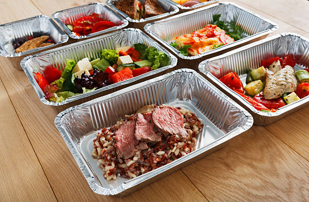 istock Healthy food in boxes, diet concept. 635965402