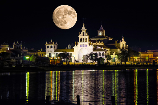 Night view of El Rocio hermitage, small village in Almonte, Huelva, Andalusia, Spain.The El Rocío pilgrimage is the most famous in the region, attracting a million people from across the entire country, and beyond
