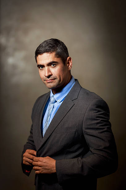 istock Confident mature businessman standing in office 635966436