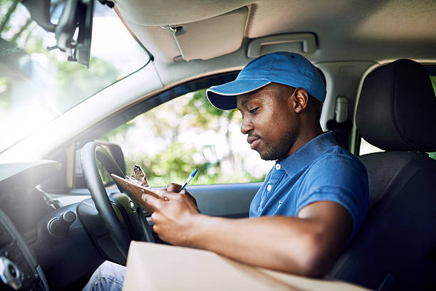 istock Logging every one of his deliveries 635967916