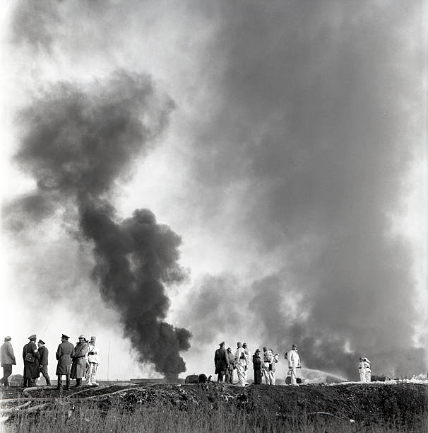 smoke coloumns at the fire fighting trainings - water cannon imagens e fotografias de stock