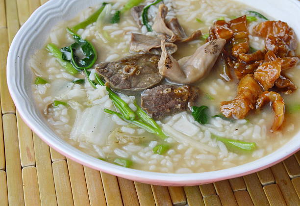 istock boiled rice porridge with pork entrails on bowl 635971894