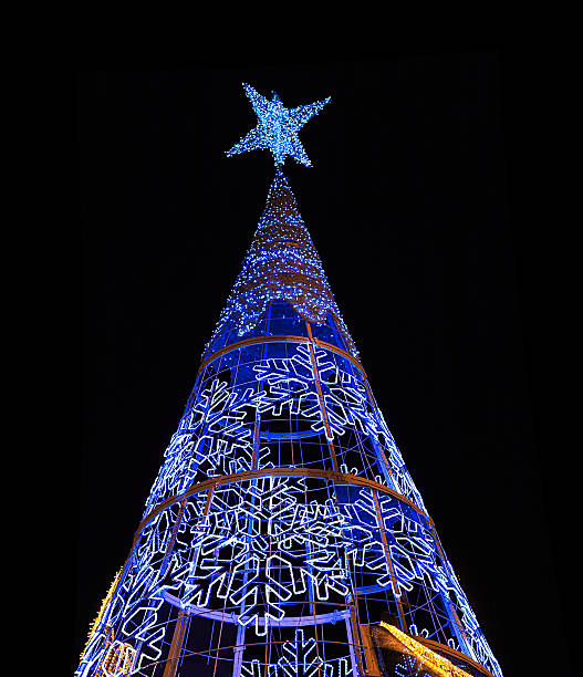istock Big Christmas tree at night in Seville, Spain 635974250