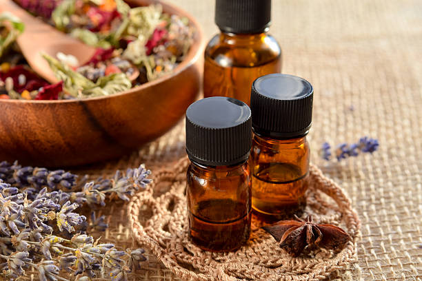 istock essential oils with dried herbs for beauty treatment 635978860