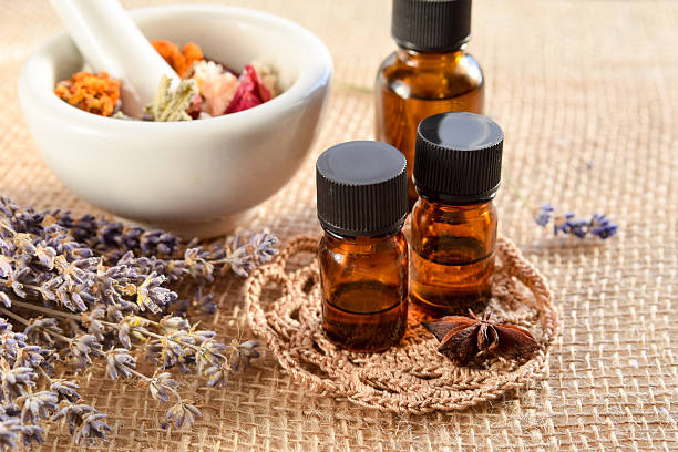 istock alternative therapy with dried herbs and essential oils 635979072