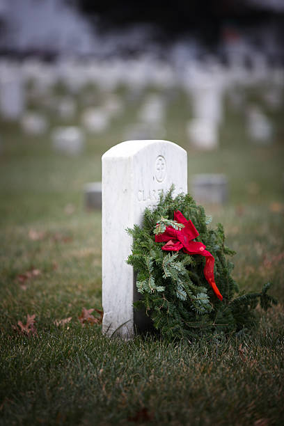istock Freshly decorated grave at Arlington National Cemetery 635979396