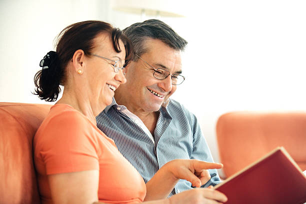 istock Senior couple in living room 635980142