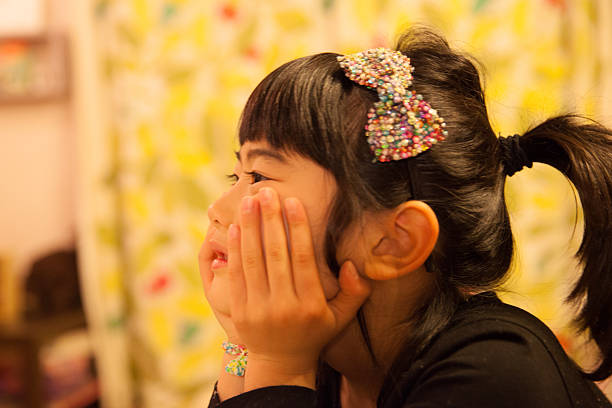 istock Pretty Japanese girl thinking 635982370