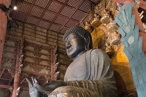 Nara, Japan - December 28, 2014: World largest bronze buddha statue in the Todai-ji temple