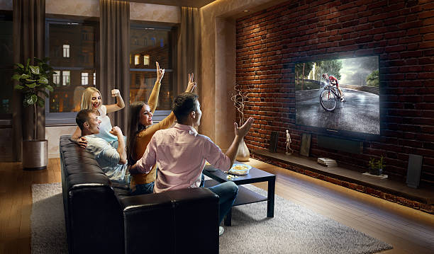 istock Couples watching Bicycle race at home 635987774