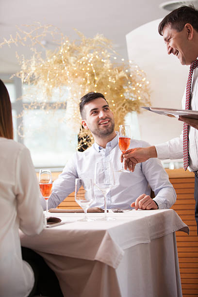 istock Young Couple Enjoying an Aperitivo before Dinner 635989556