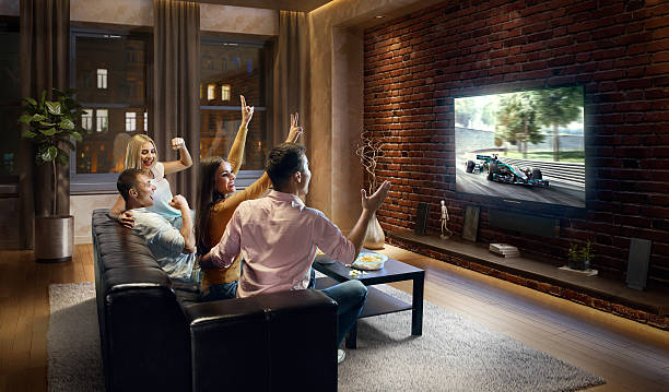 istock Couples watching Car sprint at home 635989570