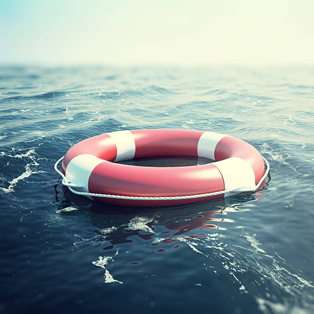 Red lifebuoy floating in the sea. 3d illustration Red lifebuoy floating in the sea, 3d illustration buoy stock pictures, royalty-free photos & images