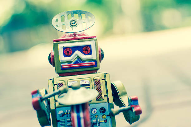 istock Old robot toy, vintage color style. 635990858