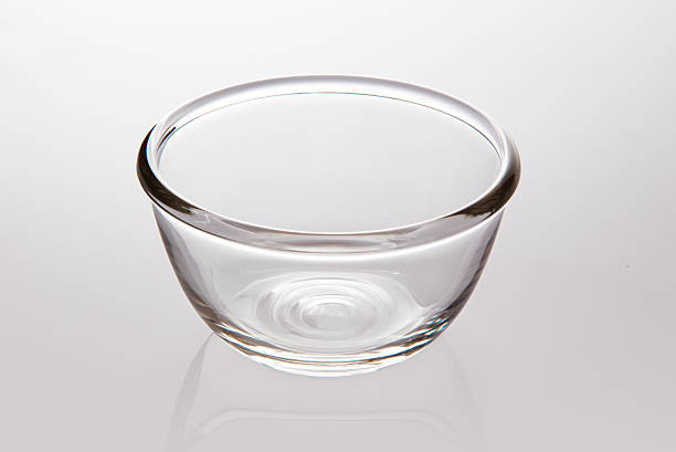 istock Single clear glass bowl on light gray background 635991834