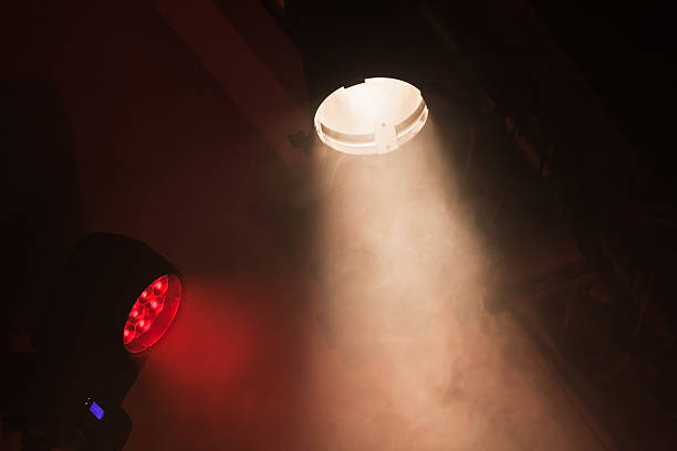 istock Stage spot lights with smoke in beams 635992198